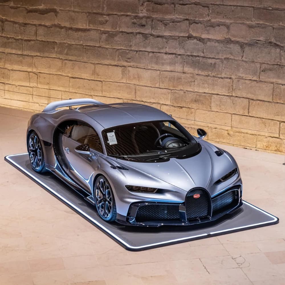Bugatti Chiron standing on an illuminated Fahrengold Carpad