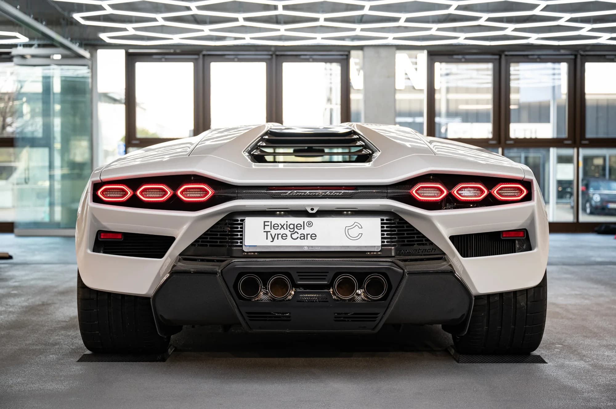 Rear of a Lamborghini Countach parked on tire cradles