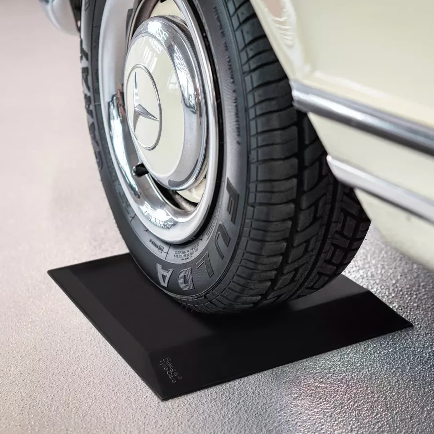 FlexiGel Classic cradle under the whitewall tire of a classic car